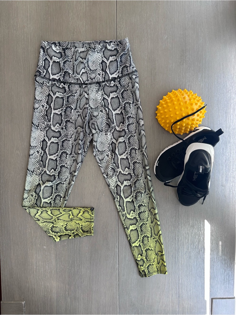 Onzie Snake-Print Leggings in Black with Ombré Yellow